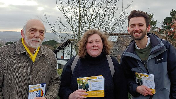 From left to right: Cllr Michael Mitchell, Cllr Tammy Palmer, Will Aczel. All holding up canvassing cards