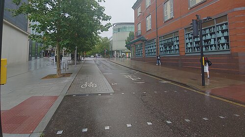 Road outside John Lewis early 2023. Currently one-way road and contraflow cycle lane.