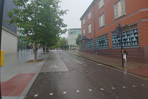 Road outside John Lewis early 2023. Currently one-way road and contraflow cycle lane.